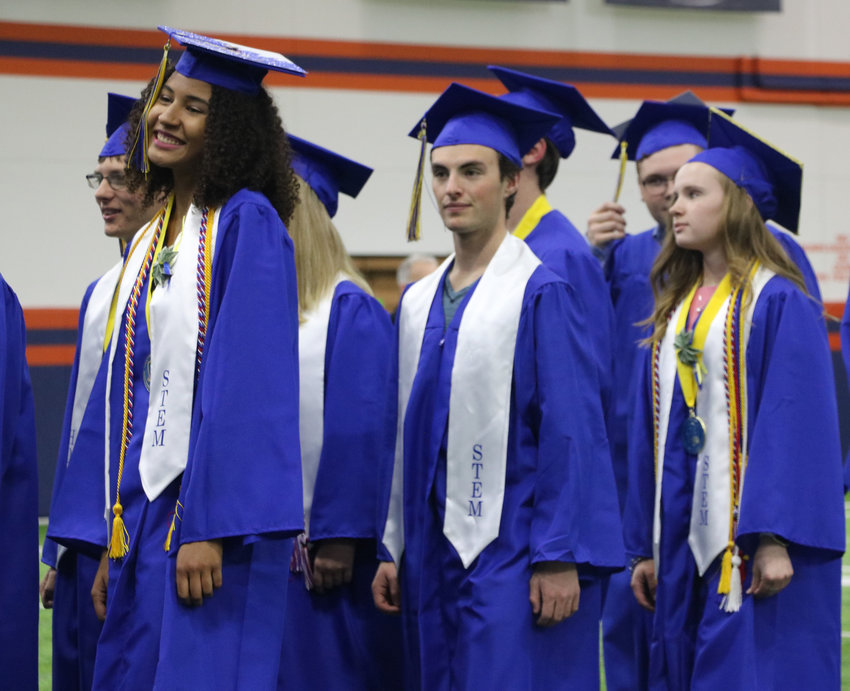 STEM School Highlands Ranch graduates wait to be seated at a May 20 commencement ceremony at the Broncos Training Facility in Centennial. Hundreds of guests showed up to support the graduating class.